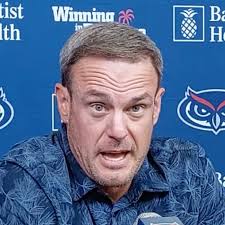 Tom Herman finally gives explanation for chasing down former Tennessee OC  Alex Golesh and it's as bizarre as you'd expect