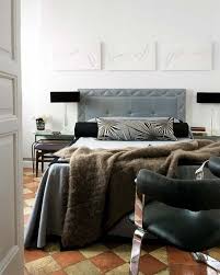Dark oak flooring, wall panels and ceiling planks make up most of the general surface, while the other parts of the walls and ceiling are painted in white. 34 Stylish Masculine Bedrooms Godfather Style
