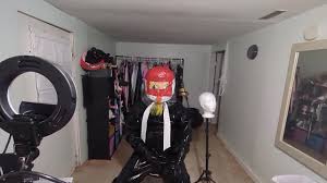 Kigurumi in heavy rubber breathplay rebeathing air from their suit