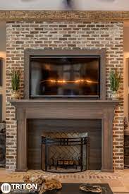Reclaimed Brick Fireplace Also Provided Reclaimed Beams Mantel And Tv Enclosure Fireplace Brick Fireplace Reclaimed Brick