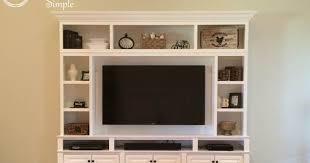 The couple who built it loves the open and airy look it adds to the room. Downright Simple Diy Tv Built In Wall Unit