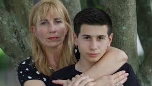 Raimondo signs education bills