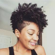 Not exactly the simplest shaved hairstyle, but there's something we love about it: Black Hair Shaved Sides Hairstyles Novocom Top