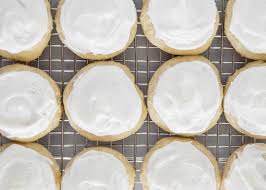 Adjust the consistency with a little water or more confectioner's sugar to make a glaze thick enough to stick to the cookies when dipped. Frosted Ricotta Cheese Cookies I Heart Naptime