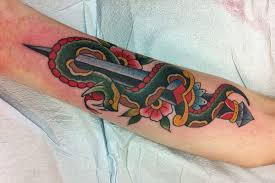 In this article we have compiled 15+ best dragon tattoos for you! American Traditional Snake And Dagger Tattoo Meaning