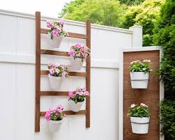 I'm a plant lover and i had the perfect window for several plants but no room to have them. Remodelaholic How To Build An Easy Diy Wall Planter Ladder