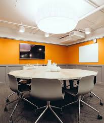 Large Round Table Conference Room Allows For Easy Conversation During A Business Meeting Room Furniture Design Meeting Room Furniture Furniture Design