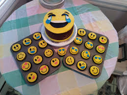 Birthday Cake Ideas For 9 Year Old Boy Emoji Cake For A 9 Year Old Girl Chocolate Fudge Cake And Cupcakes With Fondant Emoji Toppers