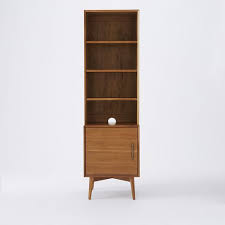 Mid Century Bookcases Acorn This closed case has eight cubbies where you can store books, family photos, or art.