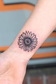 Get Yourself Inspired With Our Sunflower Tattoo Ideas Wrist Tattoos Girls Tattoos For Women Flowers Sunflower Tattoo