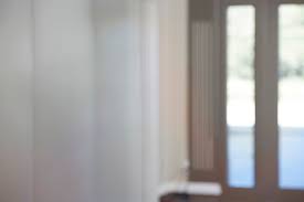 Solid white creates a simple background that ensures that there aren't any distractions behind your subject. Headshot Photography With Specific Background S Christina Cookson Photography