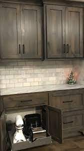 Kitchen is one of the spaces in the house where you can actually release stress through cooking or preparing desserts! Sherwinwilliams Classic Gray Grey Stain Stained Cabinets Knotty Alder Black Hardwa Custom Kitchen Remodel Rustic Kitchen Cabinets Kitchen Renovation
