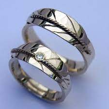 Http Nativeamericanencyclopedia Com The Native American Wedding Rings Native American Wedding Rings Native American Wedding Feather Wedding Ring