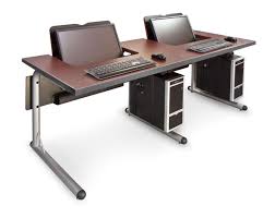 The mayan walnut hidden home office is a innovative computer desk which is designed to hide all computer equipment. Smartdesks Ilid Computer Lab Tables That Hide Away Lcds
