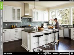Love Gray Blue Tile Island With Sink Off Center White Cabinetry Want Full Height Ca Wood Floor Kitchen Trendy Kitchen Backsplash Cool Kitchen Appliances