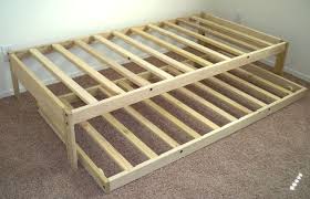 Also called truckle beds, trundle beds consist of a bed frame on wheels which fits (with its mattress) beneath an ordinary bed, or beneath a specialized bed like a bunk bed or daybed. Full Size Bed With Trundle Bed Guest Room Ideas Toddler Guest Room Ideas Playroom And Study Room Ideas Ka Trundle Bed Trundle Bed Frame Trundle Beds Diy