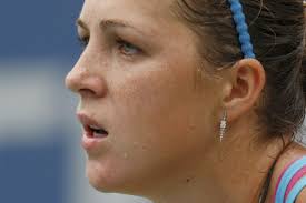 Pavlyuchenko's 12th trophy, Larson grabbed her second title