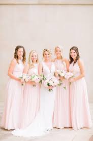 These Blush Bridesmaids Dresses From Beside The Bride Compliment The White Of The Bride S Gown Be Wedding Inspiration Blush Bridesmaid Dresses Wedding Magazine