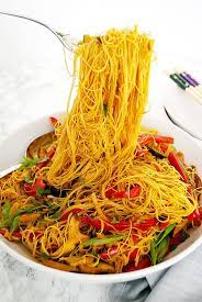 A Serving Bowl Filled With Vegan Singapore Noodles Vermicelli Recipes Singapore Noodles Cooking Recipes