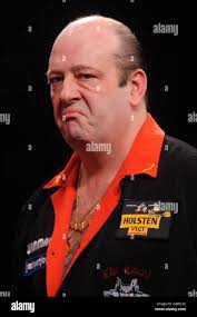 England's Ted Hankey reacts during his match against Martin Atkins in the  quarter finals of the BDO World Professional Darts Championships Stock  Photo