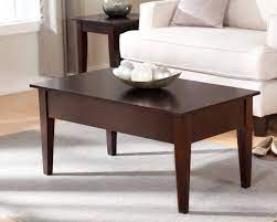 This coffee table has a swiveling top that functions as a shelf, and two sliding drawers for storage. This Type Of Coffee Table Is The Best For Small Spaces Coffee Table Coffee Table Small Space Types Of Coffee Tables