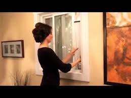 Position the unit's bottom guide, or flange, flush fasten the side panels. Learn How To Install A Haier Portable Air Conditioner Into A Sliding Window Youtube