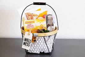 Some of the coolest gift baskets come in a bucket! Wellness Gift Basket Idea All For The Memories