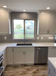Using darker grout is a great way to add definition and visual intrigue to your design, especially when it complements black accents like those pictured here. Kitchen Remodel Before And After 365 Days Of Slow Cooking And Pressure Cooking