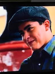 Roberto Clemente, Jr., kissing his father's picture.