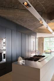 Concrete Ceiling Beams And Columns Have Been Exposed During The Renovation Of This Centra Interior Design Kitchen Kitchen Interior Interior Architecture Design