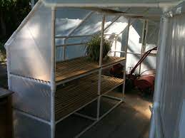 Build A Pvc Greenhouse Pvc Greenhouse Backyard Greenhouse Diy Greenhouse Plans