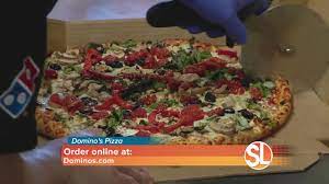 A domino's pizza delivery driver brings food to customers in a timely manner. Domino S Pizza Now Offering Delivery Insurance