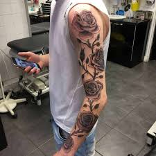 The most famous design depicts a rose growing out of a skull's eye sockets. The Top 75 Best Rose Tattoo Ideas In 2021
