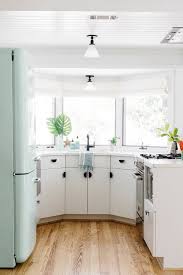 White Cabinetry White Shiplap Walls White Tongue And Groove Ceiling Black Half Circle Har Kitchen Remodel Small Kitchen Inspiration Design Kitchen Design