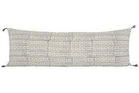 More streamlined and tailored than a gaggle of smaller throw pillows. All Your Bed Needs Is A Lumbar Pillow Architectural Digest