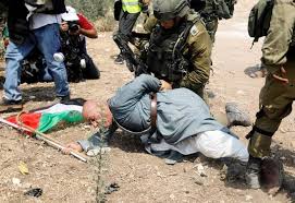 In the manner of George Floyd: The Israeli occupation army attacks an elderly Palestinian Images?q=tbn%3AANd9GcQOGlHeWpISFPcqTxkQQXH-Lamd2S_nL1-IkA&usqp=CAU