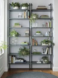 9 Ideas For Creating A Stylish Bookshelf Greenery Plants Literally Give Life To The Shelve Bookshelf Design Home Decor Accessories Apartment Living Room
