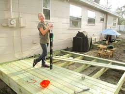 How I Built My Diy Floating Deck For Less Than 500 Diy Deck Platform Deck Building A Floating Deck