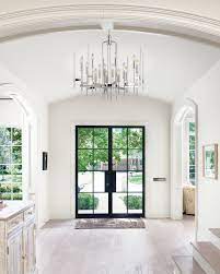 When it comes to indoor lighting and entryway lights, placing a chandelier in your foyer is an easy way to bring a feeling of. Making An Entrance How To Create Striking Entryway Lighting In Any Size Foyer Ylighting Ideas