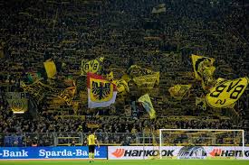 Borussia dortmund fans celebrating in santiago bernabéu stadium uefa champions league semi final dortmund fans singing before the uefa champions league game against arsenal at the. Dortmund Fans Raise 86 000 For Local Businesses Hit By Covid 19 Closures