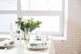 How to set a beautiful dinner table. Beautiful Festive Table Setting With Elegant White Flowers And Stock Photo Picture And Royalty Free Image Image 117232145