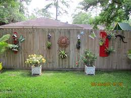 This diy privacy fence does the trick and it only took a few hours to build! Pin By Anita Huggett On Gardening Fence Decor Outdoor Fence Decor Backyard Fences