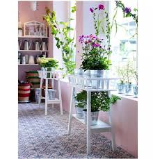 Back In Stock Our Favorite Ikea Plant Stand Gardenista Whether you prefer traditional styles or striking modern designs perfect for succulents and cacti, this white miniature planter has a specked plant pot and sculptural black base.
