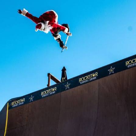 skater doing indy grab over bowl