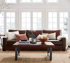 Faux leather is much easier to clean than cloth as well. Turner Square Arm Leather Sofa Pottery Barn
