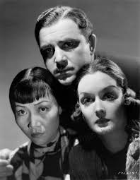 Anthony Quinn as “Nicky Kusnoff”; and Anna May Wong, reprising the role she  originated