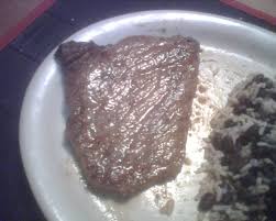 Rub the minced garlic into the steak with all of the seasonings, and allow to marinate for about 30 minutes to 1 hour in the fridge. Bistec De Palomilla Cuban Fried Steak