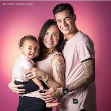 Aine coutinho with the couple's child maria at camp nou (image: Footballers Wags Kids Coutinho Family Philippe Coutinho Liverpool