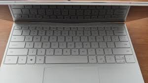 Release the tablet from the keyboard dock. Is My Screen Warped Xps 9300 Refurb Dell