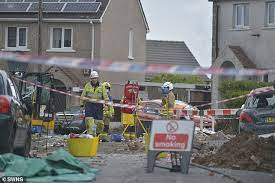 The explosion destroyed two homes and wrecked another, leaving debris littered around the area. 53tgtusbzviham
